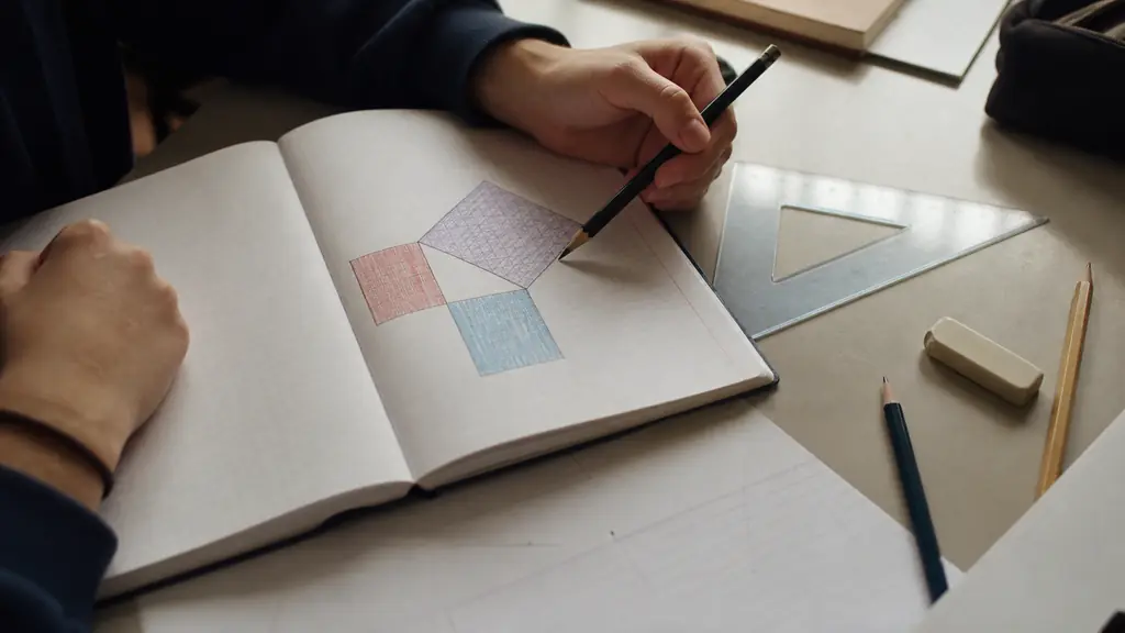 close-up photograph of a student comparing 13 squared with 5 squared plus 12 squared in a geometry notebook beside a set square, no text or logo
